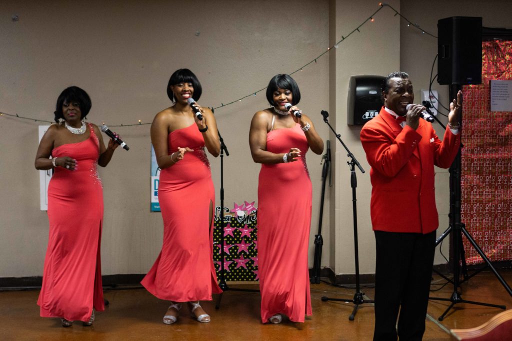Early Clover and backup singers perform for The Shade Tree residents and performers at their annual holiday event.